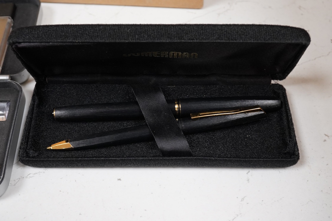 A quantity of boxed fountain pens and ballpens